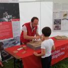 Photographie d'une animation consacrée aux meules et aux moulins